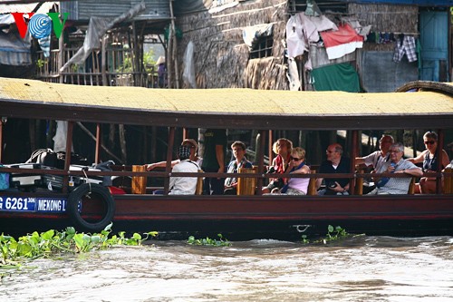 Cai Be floating market fascinates Mekong Delta visitors  - ảnh 23